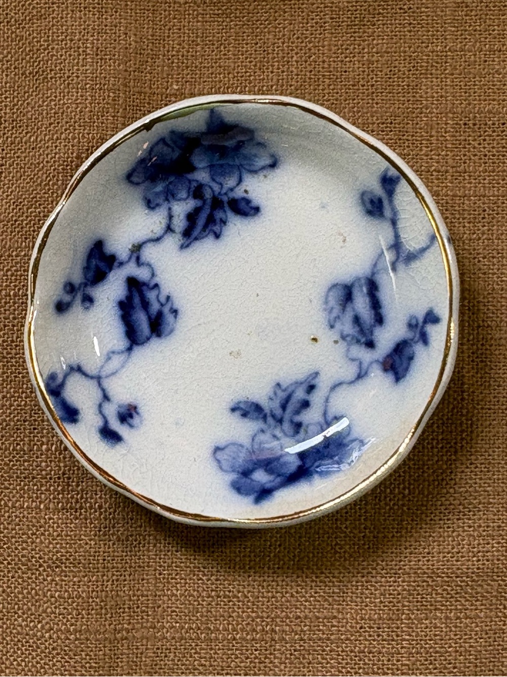 Blue Floral Dresden pattern Porcelain Antique Butter Pat with Gold Edge.
